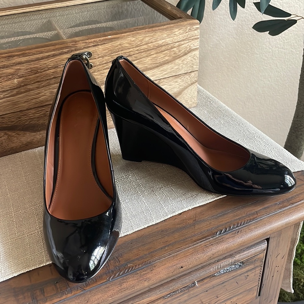 Coach black heels size 7.5.